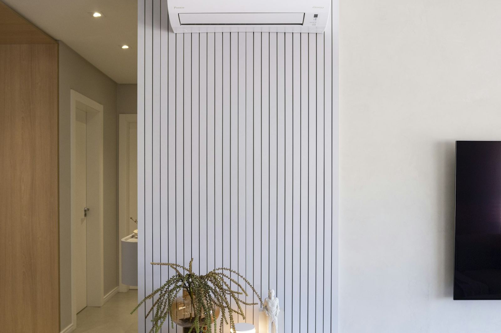 Living room with a ductless mini split wall unit